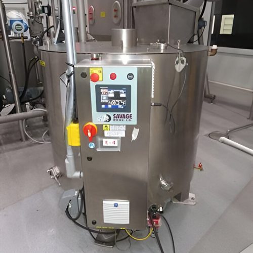 Machine Savage Bros Série 40 équipée d’un système d’agitation variable et d’une vanne guillotine pour un contrôle optimal du chocolat fondu